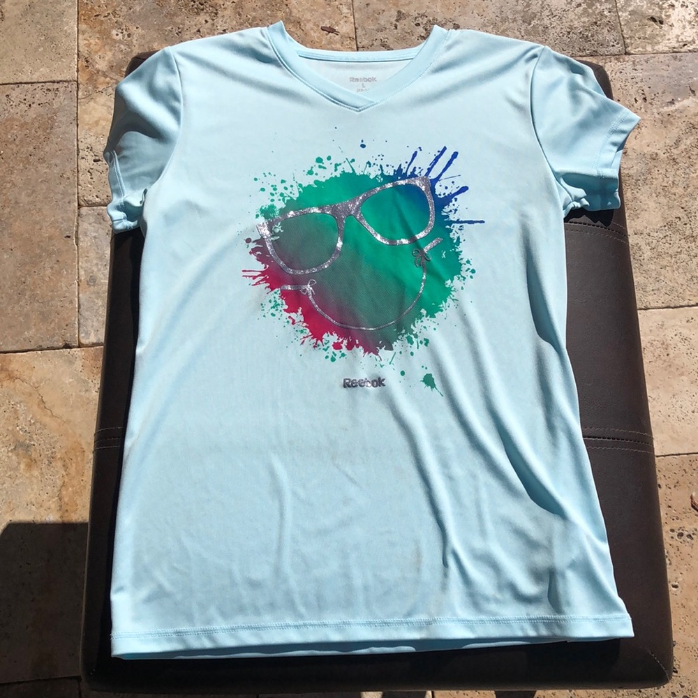 Girls Reebok sports top - Size L (12-14).